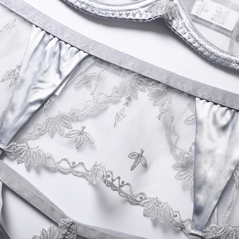 Completo intimo in rete con inserti in raso