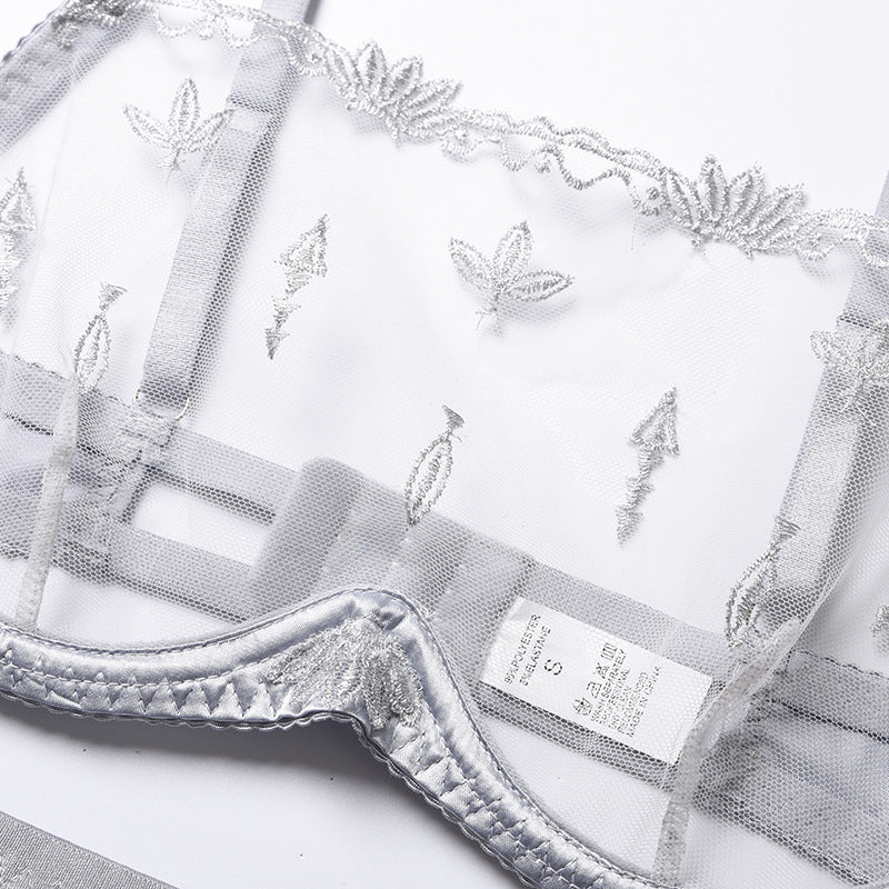 Completo intimo in rete con inserti in raso