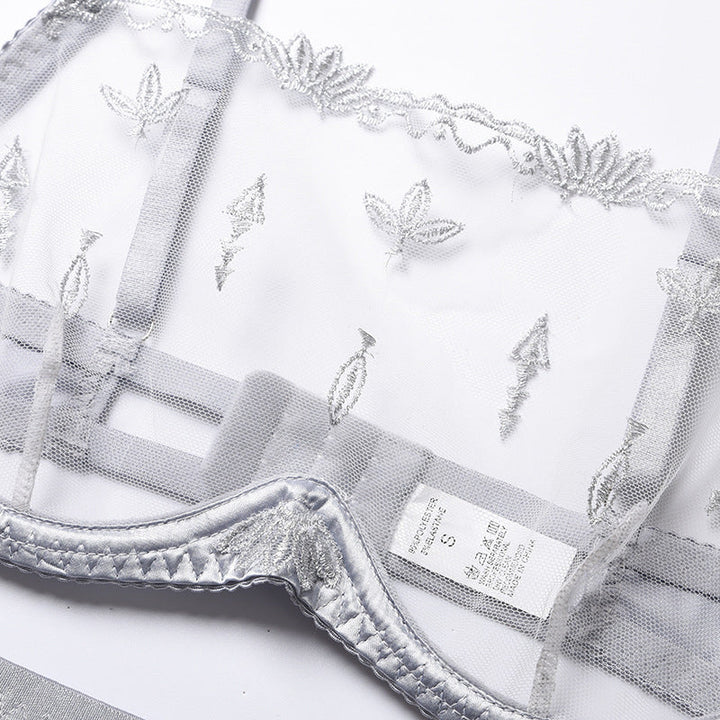Completo intimo in rete con inserti in raso