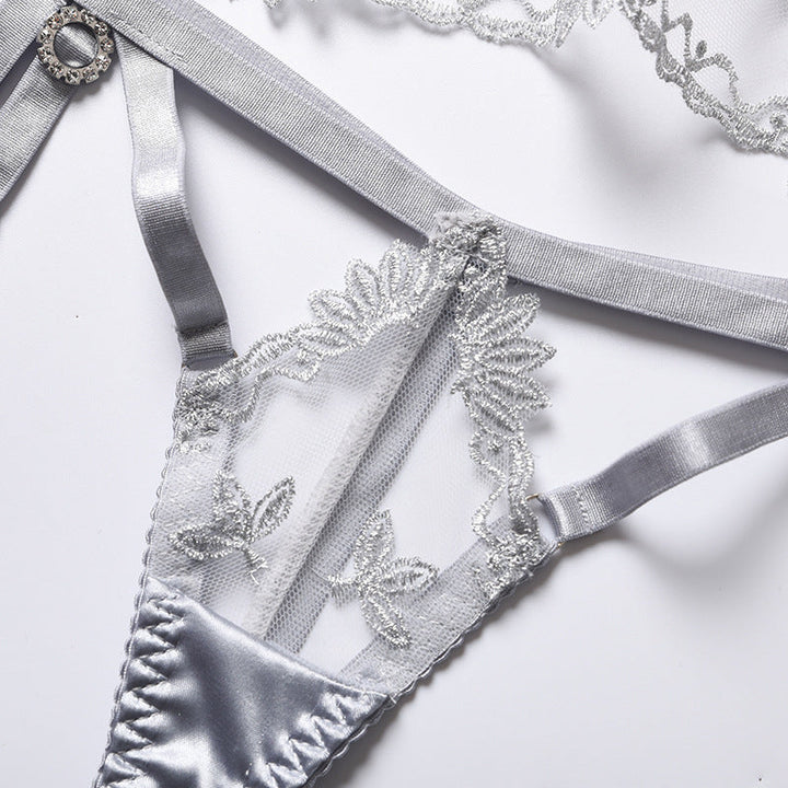 Completo intimo in rete con inserti in raso
