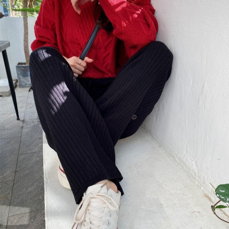 Pantaloni in denim comodi con bottoni alle caviglie