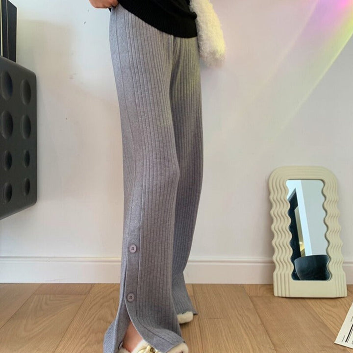 Pantaloni in denim comodi con bottoni alle caviglie