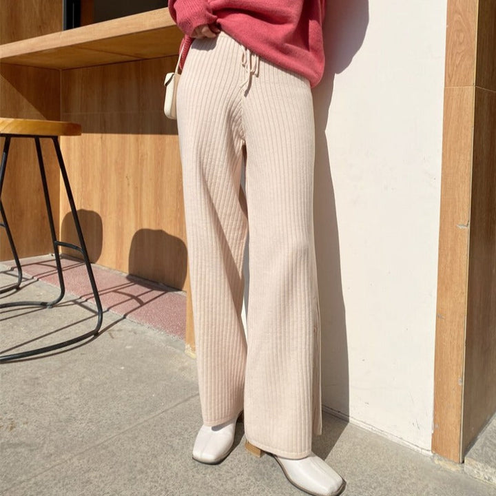 Pantaloni in denim comodi con bottoni alle caviglie