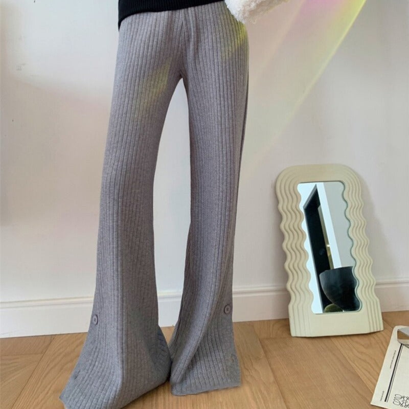 Pantaloni in denim comodi con bottoni alle caviglie