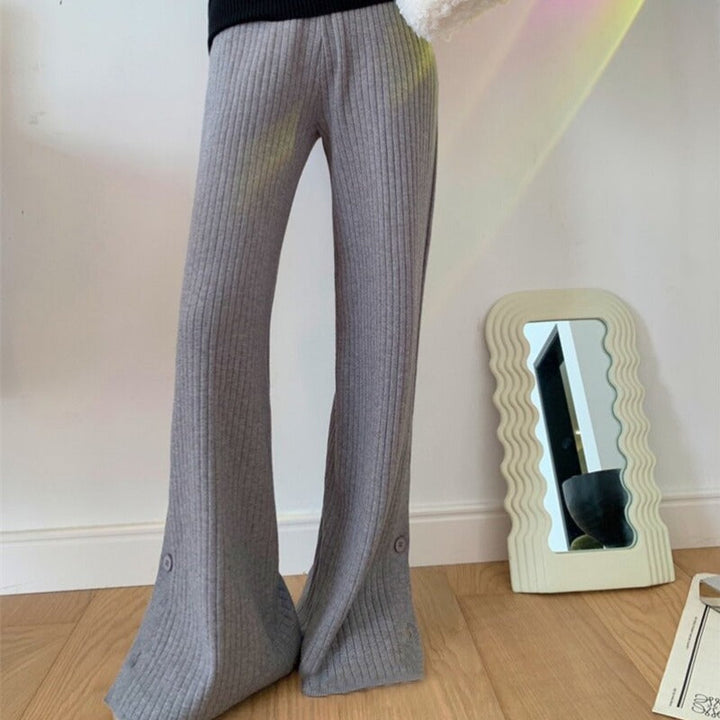 Pantaloni in denim comodi con bottoni alle caviglie